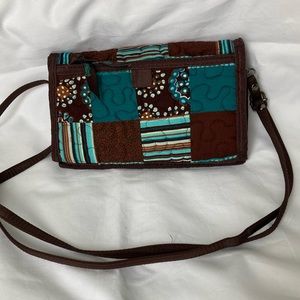 Donna Sharp Quilted bag. Tons of Space and Removable strap. Excellent condition!